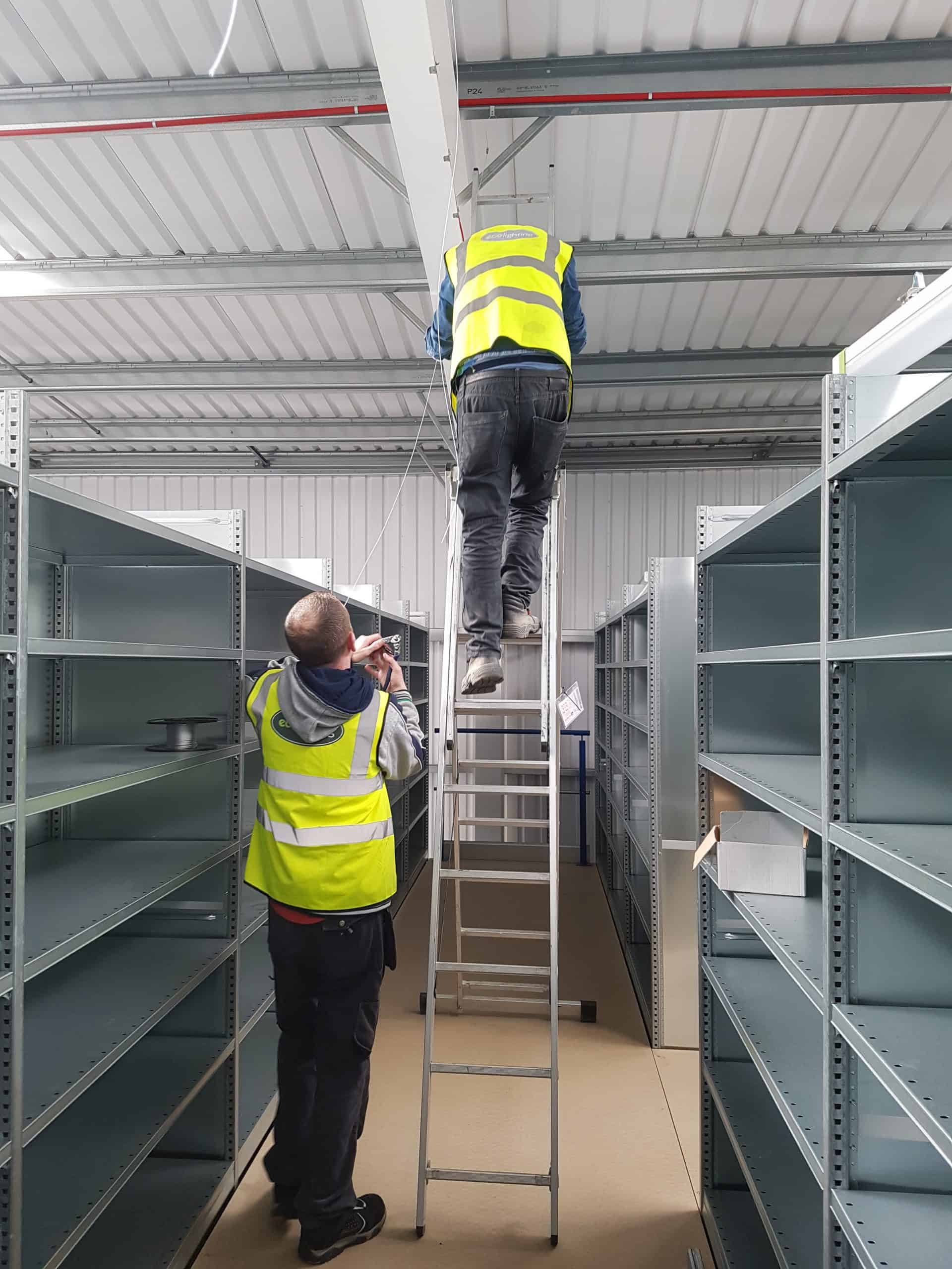 two men installing led lights