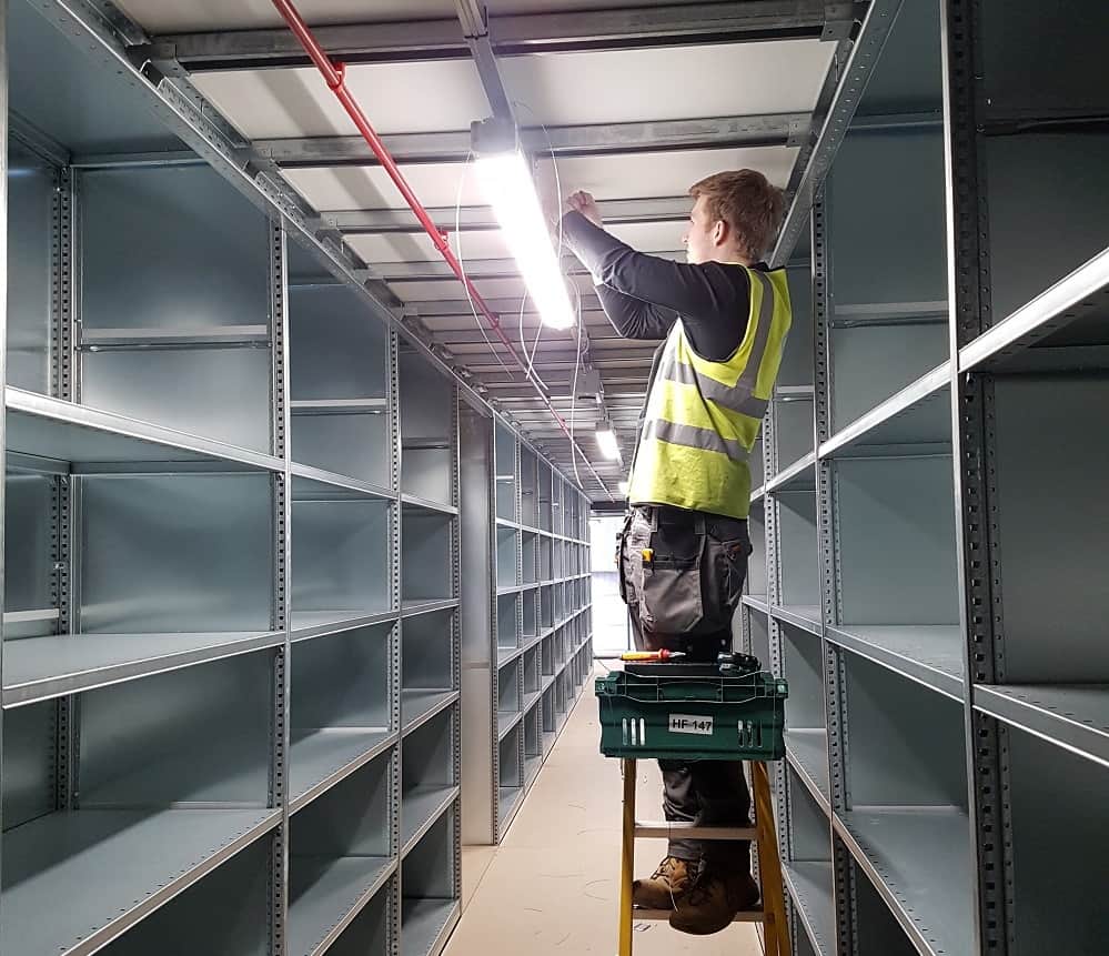 man installing sapphire lights
